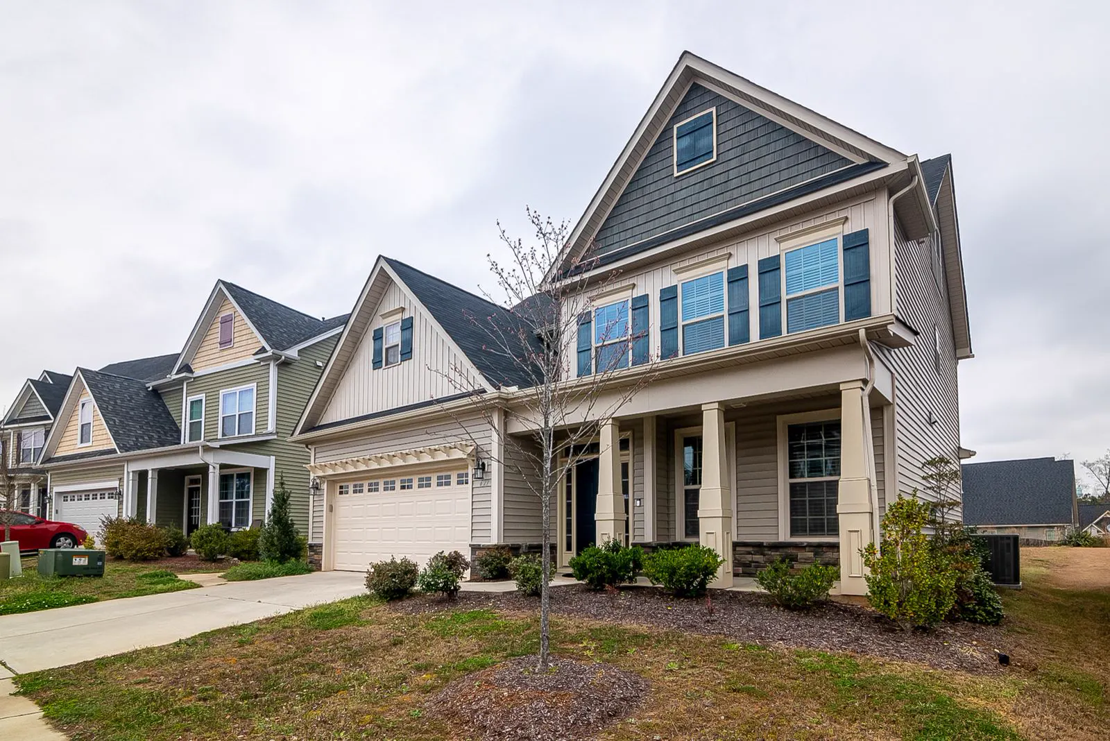 Split-level suburban home with white gutters along the roofline